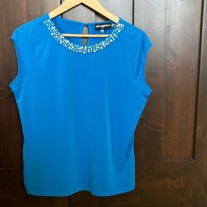 Karl Lagerfeld cap sleeve turquoise blue top.
